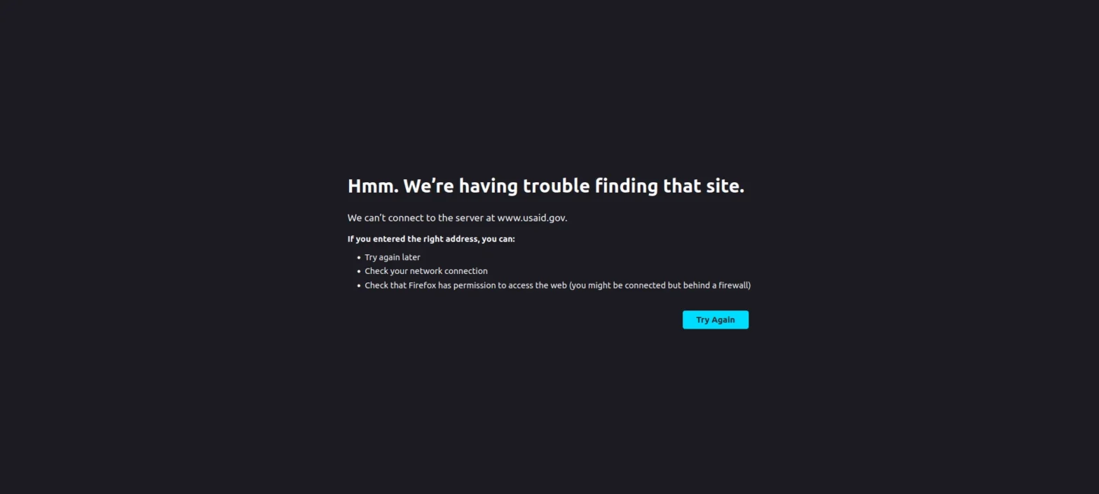 "Firefox browser error page showing 'Hmm. We're having trouble finding that site' when attempting to access www.usaid.gov, with suggestions to try again later, check network connection, and check Firefox permissions". The message currently greets anyone attempting to access the USAID.gov website.