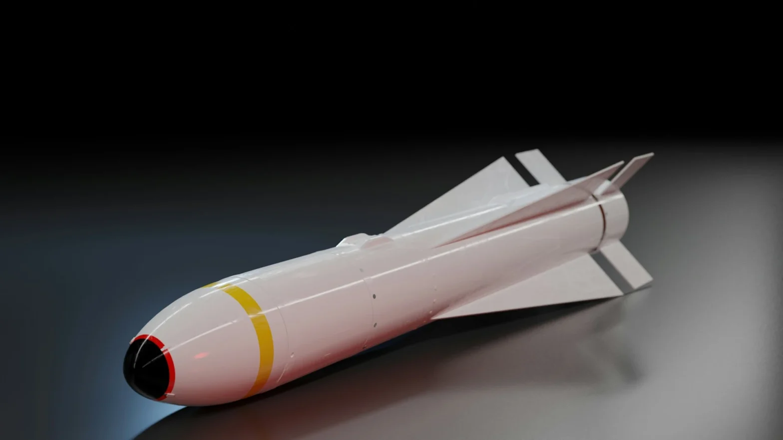 A detailed 3D rendering of a BLU-109 bunker-buster bomb shown in profile view against a dark gradient background. The bomb has a sleek white cylindrical body with stabilizing fins at the rear, a black nose cone, and distinctive yellow and red stripes around its circumference. The bomb's surface appears smooth and reflective, casting subtle shadows on the metallic surface below.